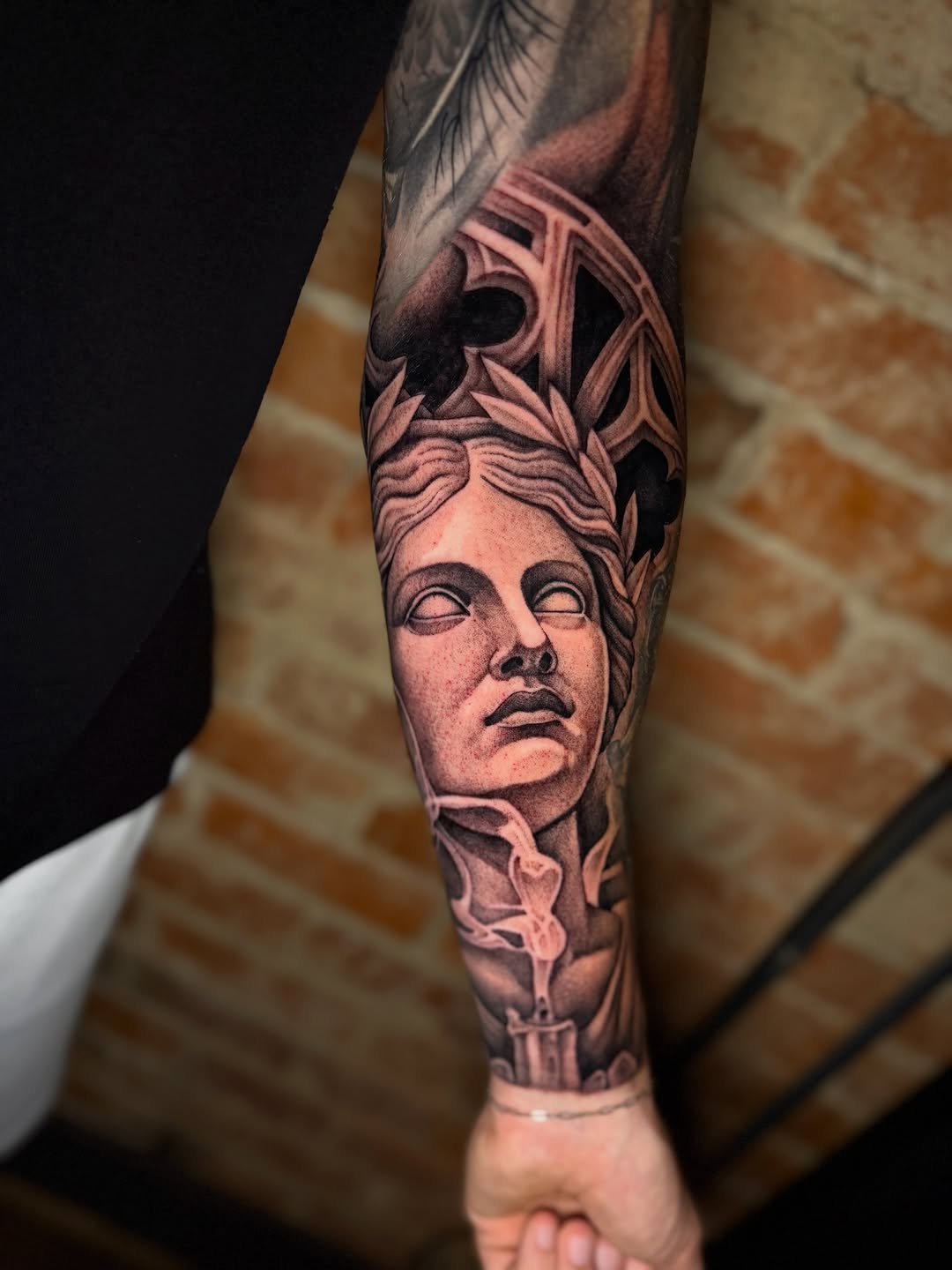 Tattoo by @tattoosbytsteck — realism, black_and_grey