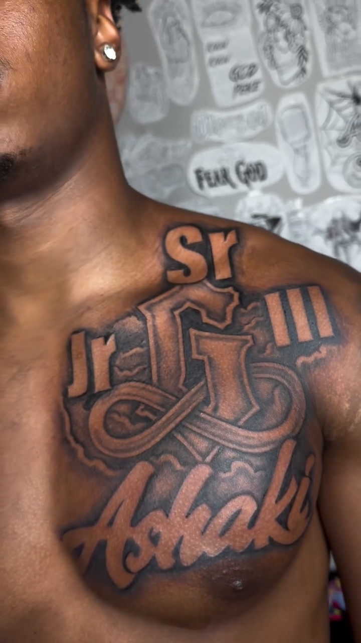 Tattoo by @jvy_den — lettering_script, black_and_grey