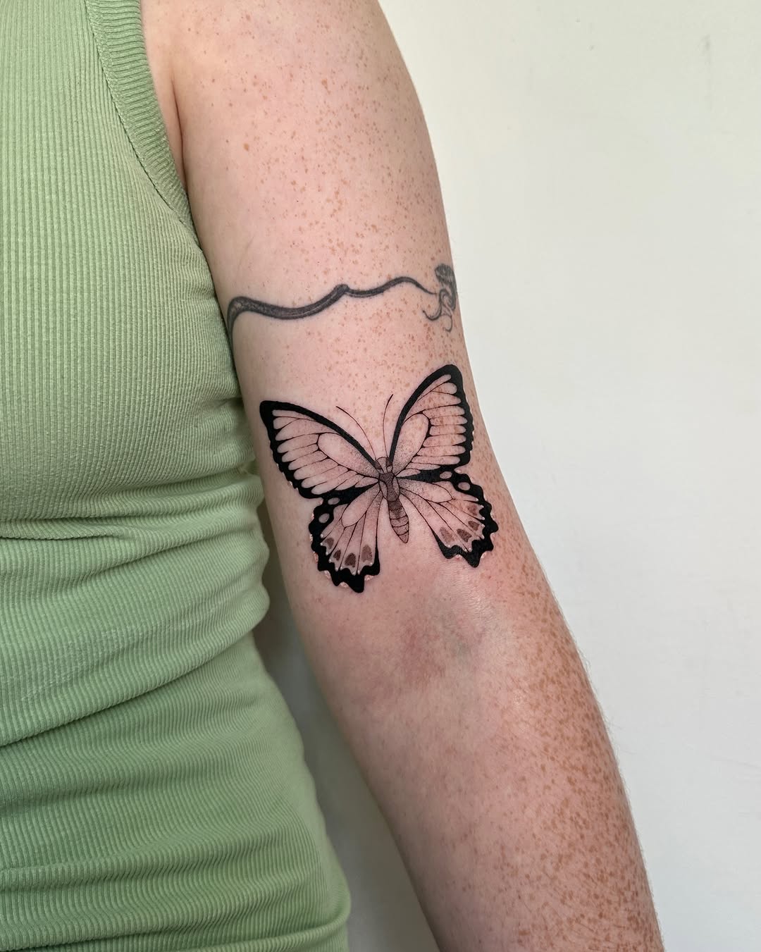 Tattoo by @tattoo.olive — fine_line, black_and_grey