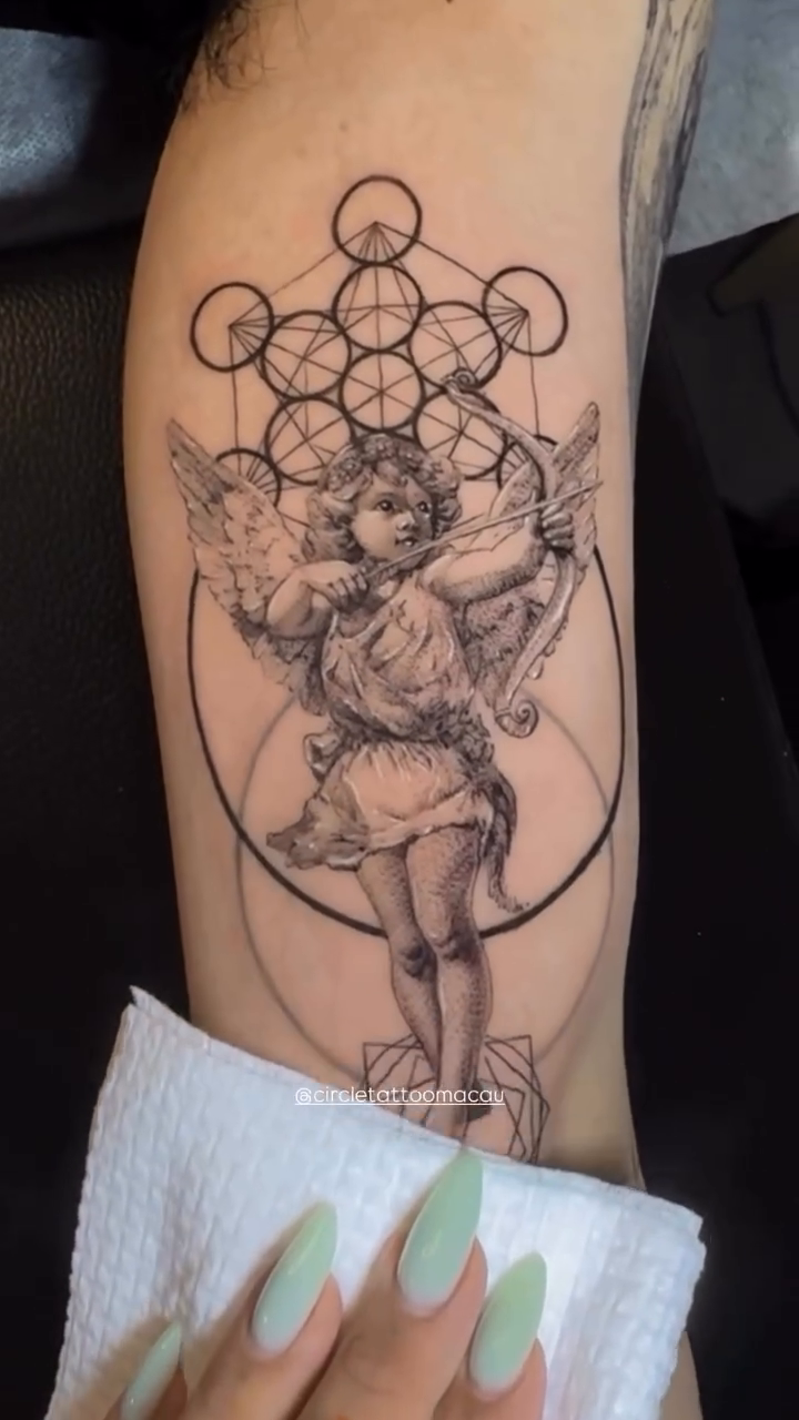 Tattoo by @circletattoo.katniss — illustrative, black_and_grey