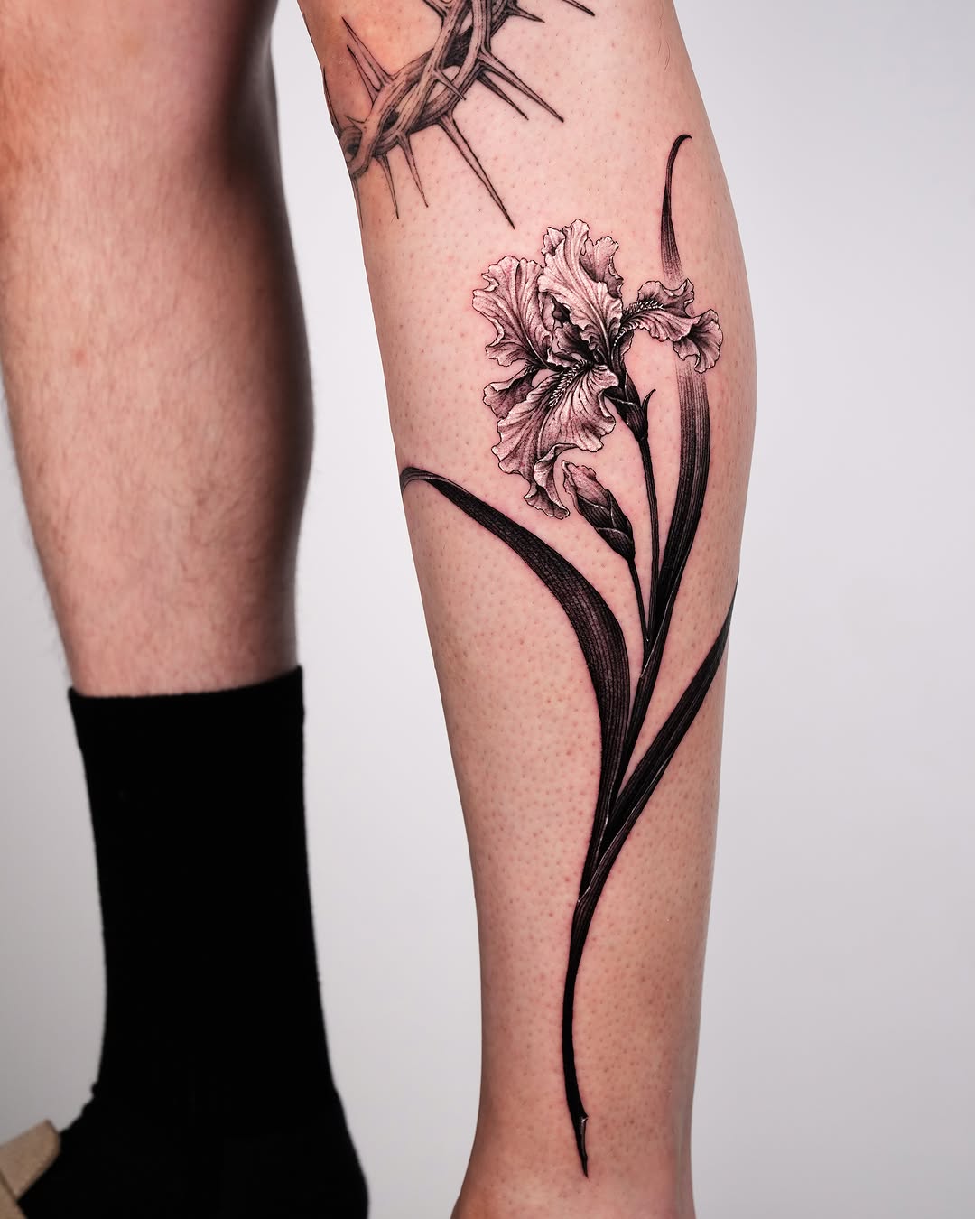 Tattoo by @tattooer_intat — black_and_grey, realism