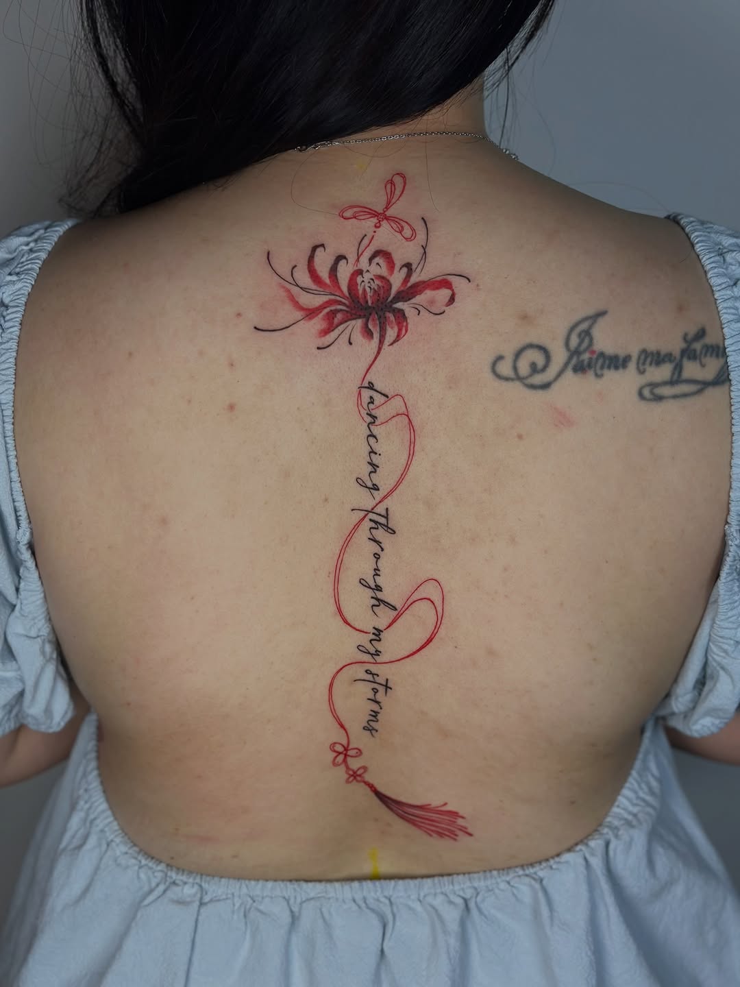 Tattoo by @tuantran.ink — fine_line, lettering_script