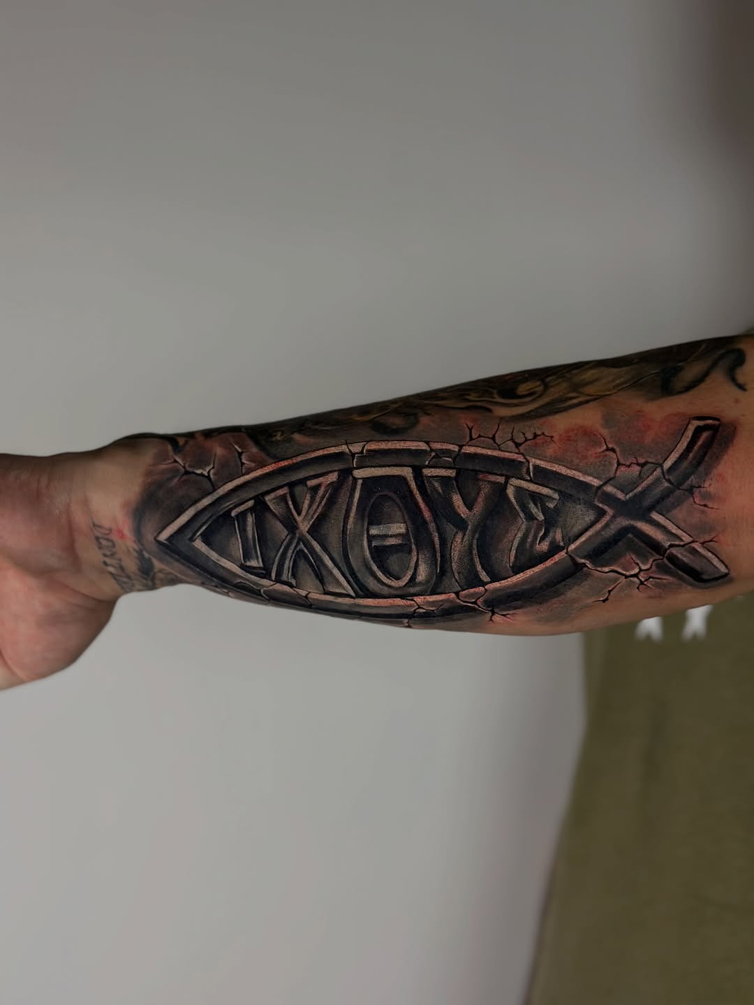 Tattoo by @tuantran.ink — black_and_grey, realism