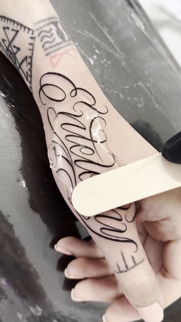 Tattoo by @fernxndojrtatts — lettering_script, illustrative