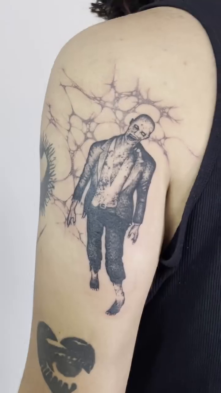 Tattoo by @tattoo.tokki — black_and_grey, realism
