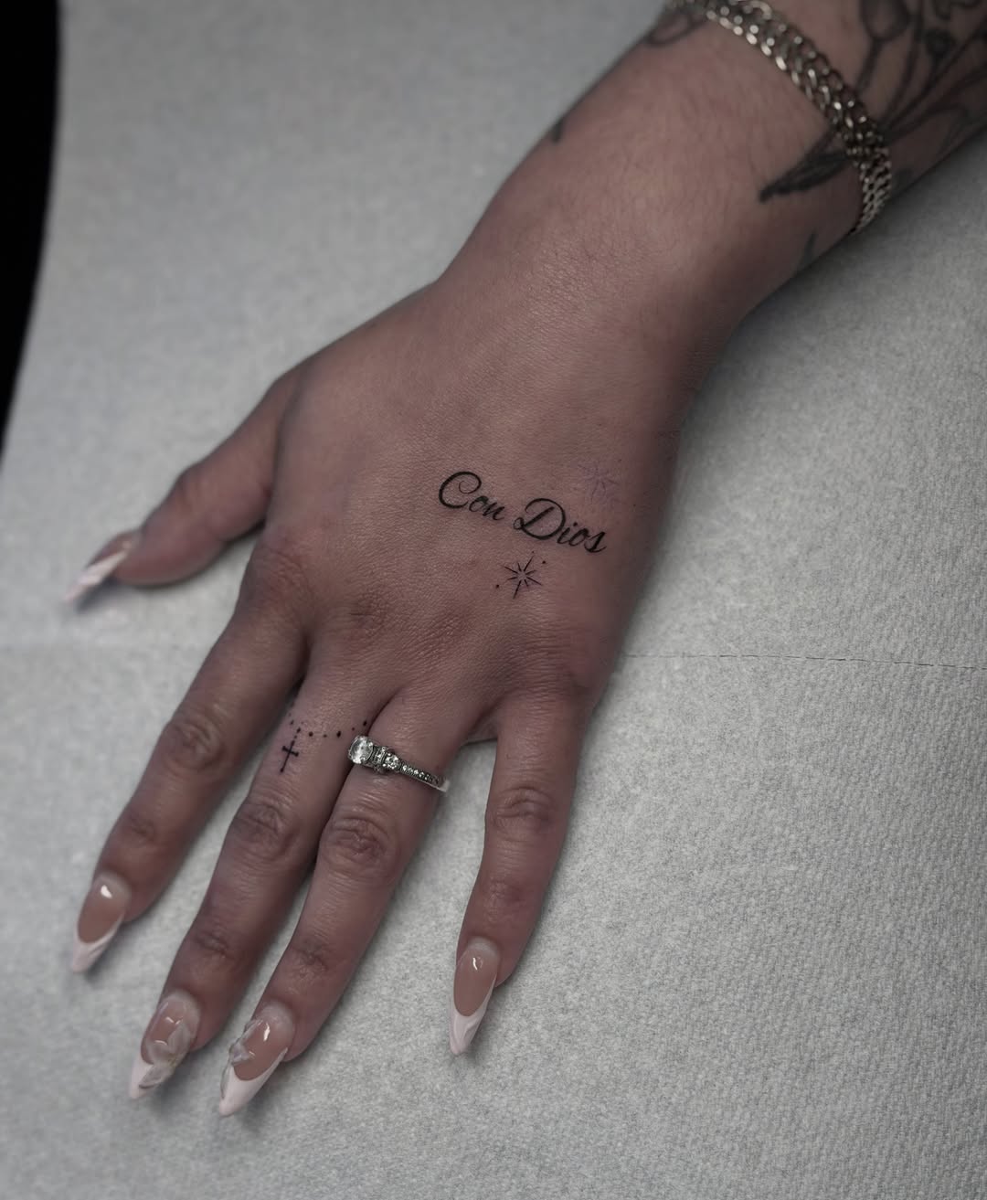 Tattoo by @cvssandra.art — lettering_script, fine_line