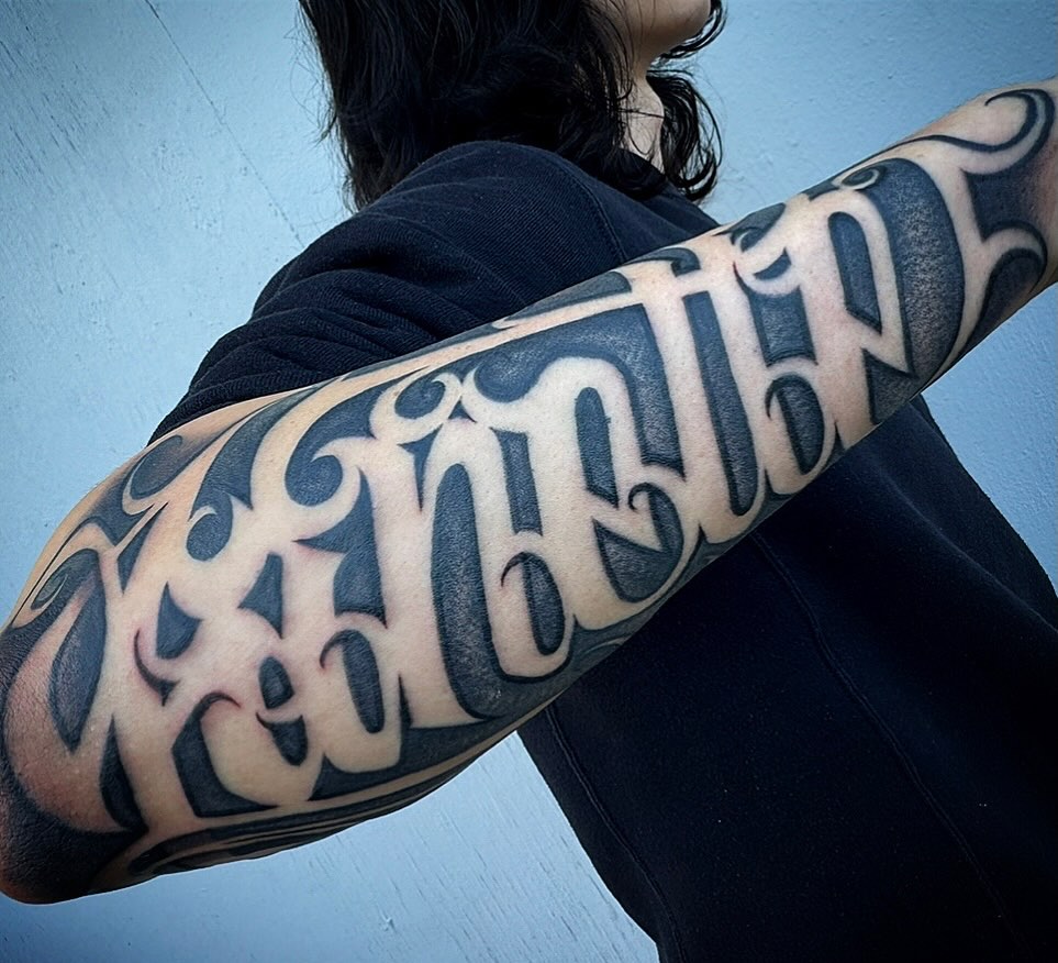 Tattoo by @dave_duck — lettering_script, blackwork