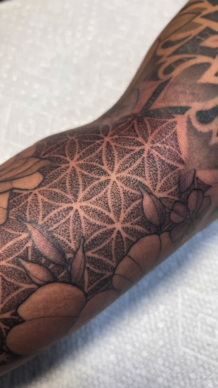 Tattoo by @alley.tat — geometric, dotwork