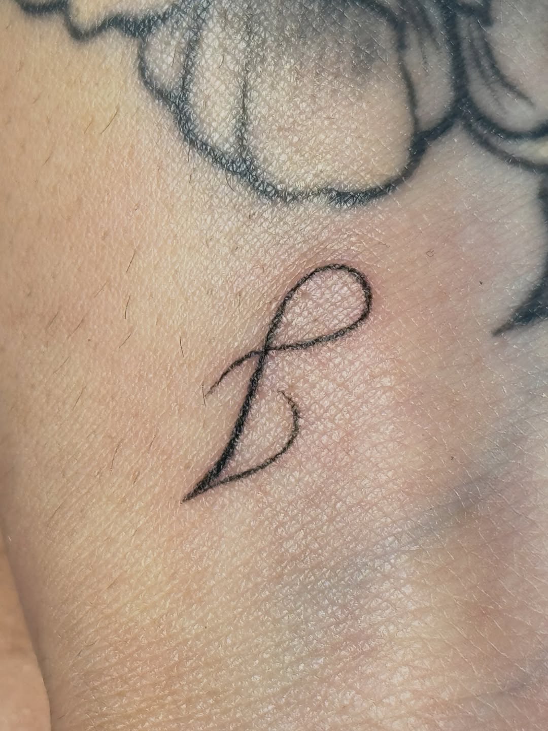 Tattoo by @avas.aesthetics__ — fine_line, lettering_script