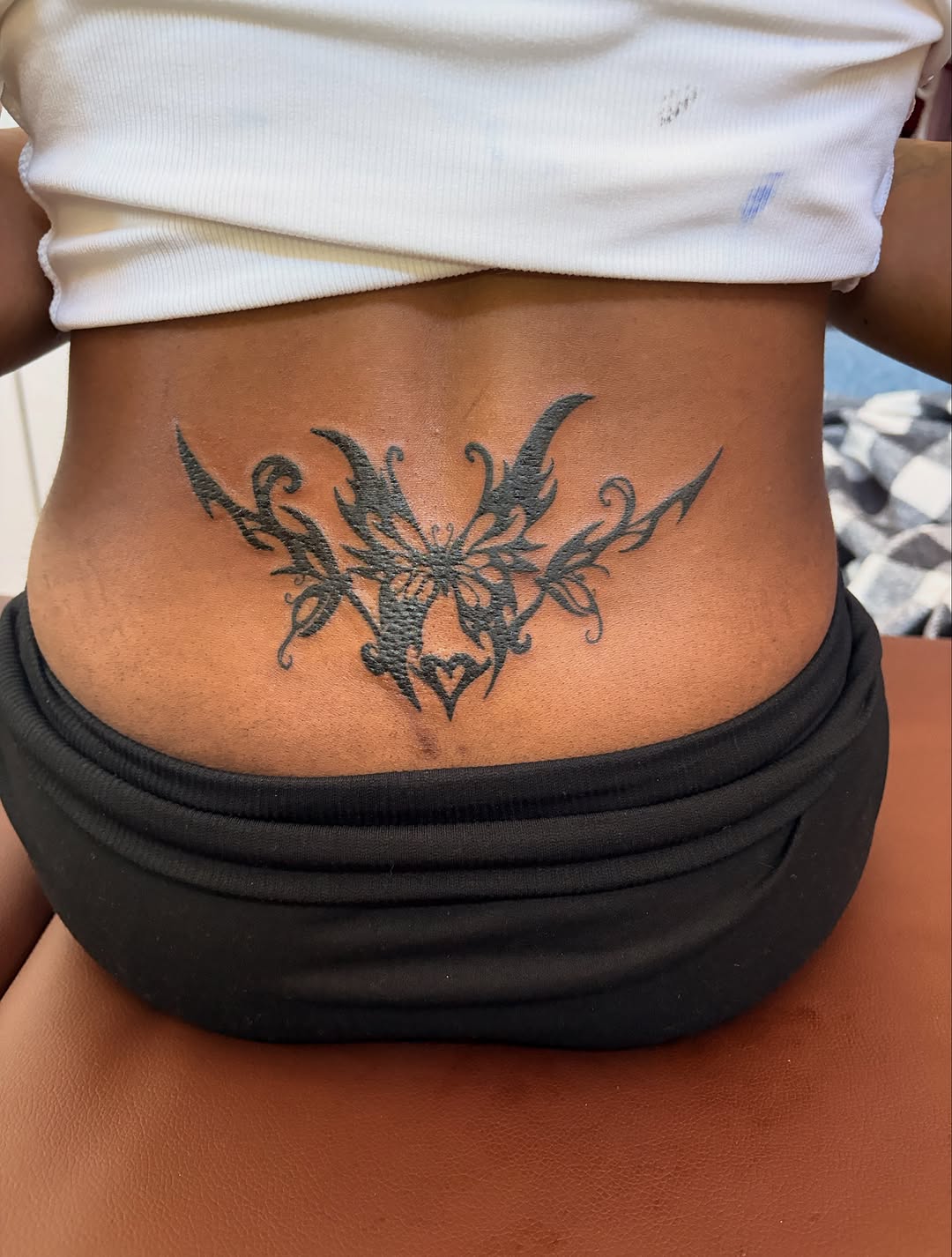 Tattoo by @riya.tatts.lv — illustrative, blackwork