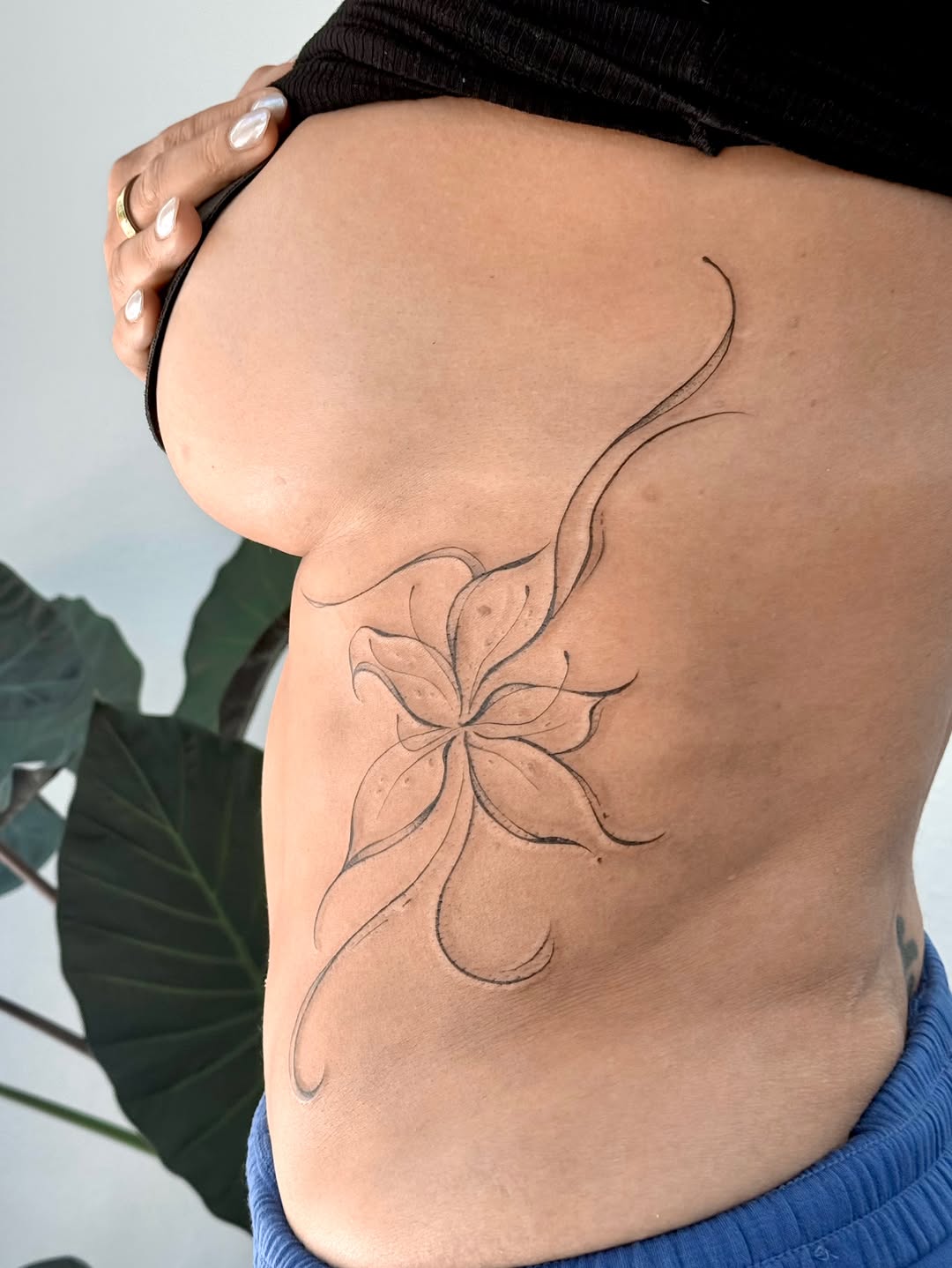 Tattoo by @pomaikai.artistry — fine_line