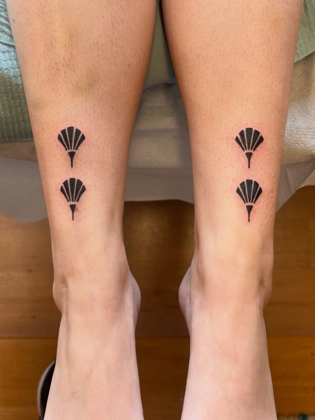Tattoo by @firestarterink — minimalist, geometric