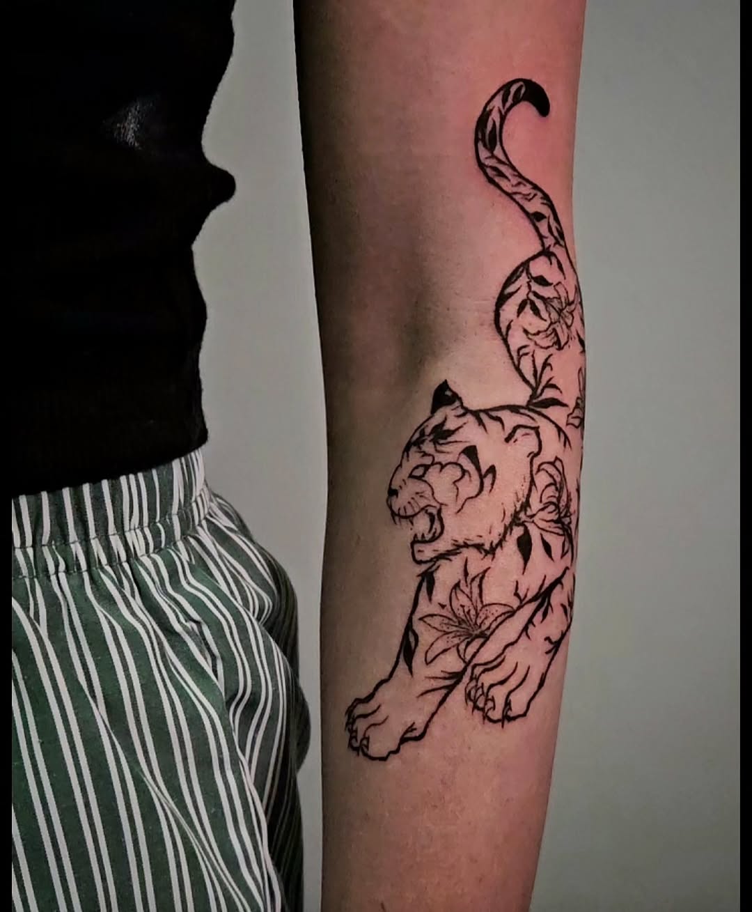Tattoo by @ghostie_tats — illustrative, blackwork