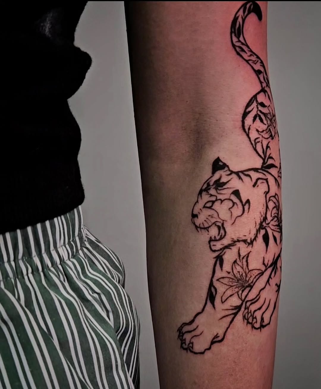 Tattoo by @ghostie_tats — illustrative, blackwork