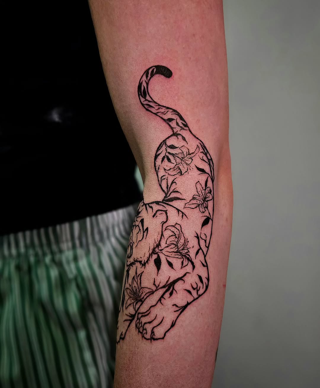 Tattoo by @ghostie_tats — illustrative, blackwork