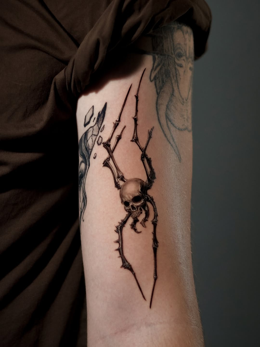 Tattoo by @comma_ttt — dark_realism, black_and_grey