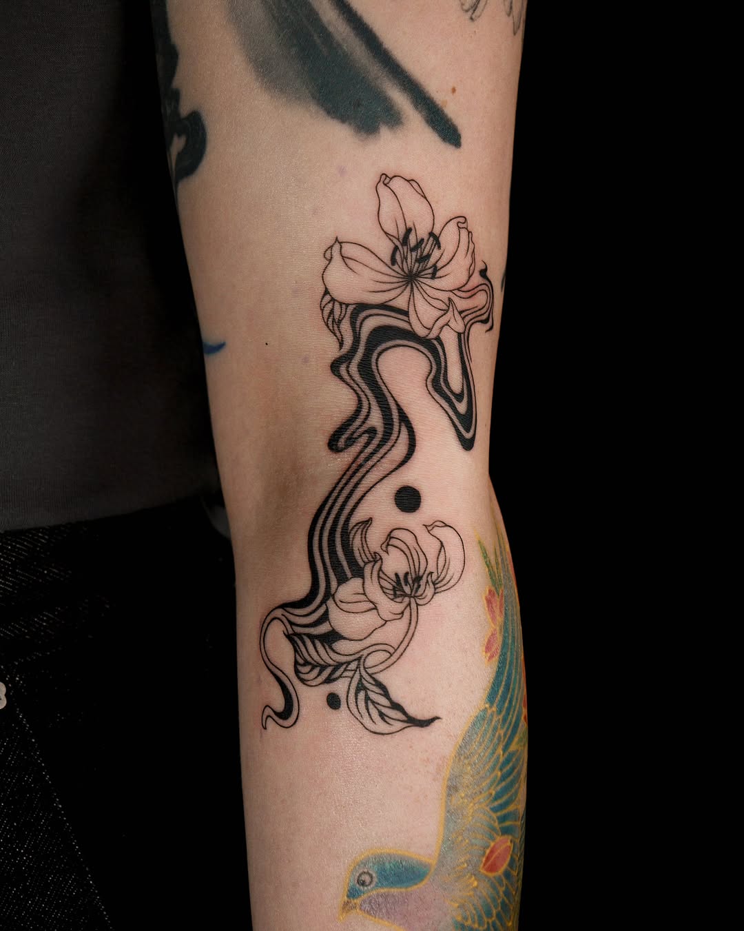 Tattoo by @you.tats — illustrative, blackwork