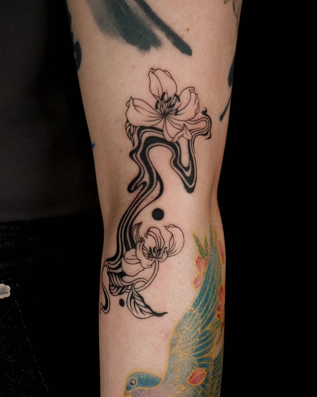 Tattoo by @you.tats — illustrative, blackwork