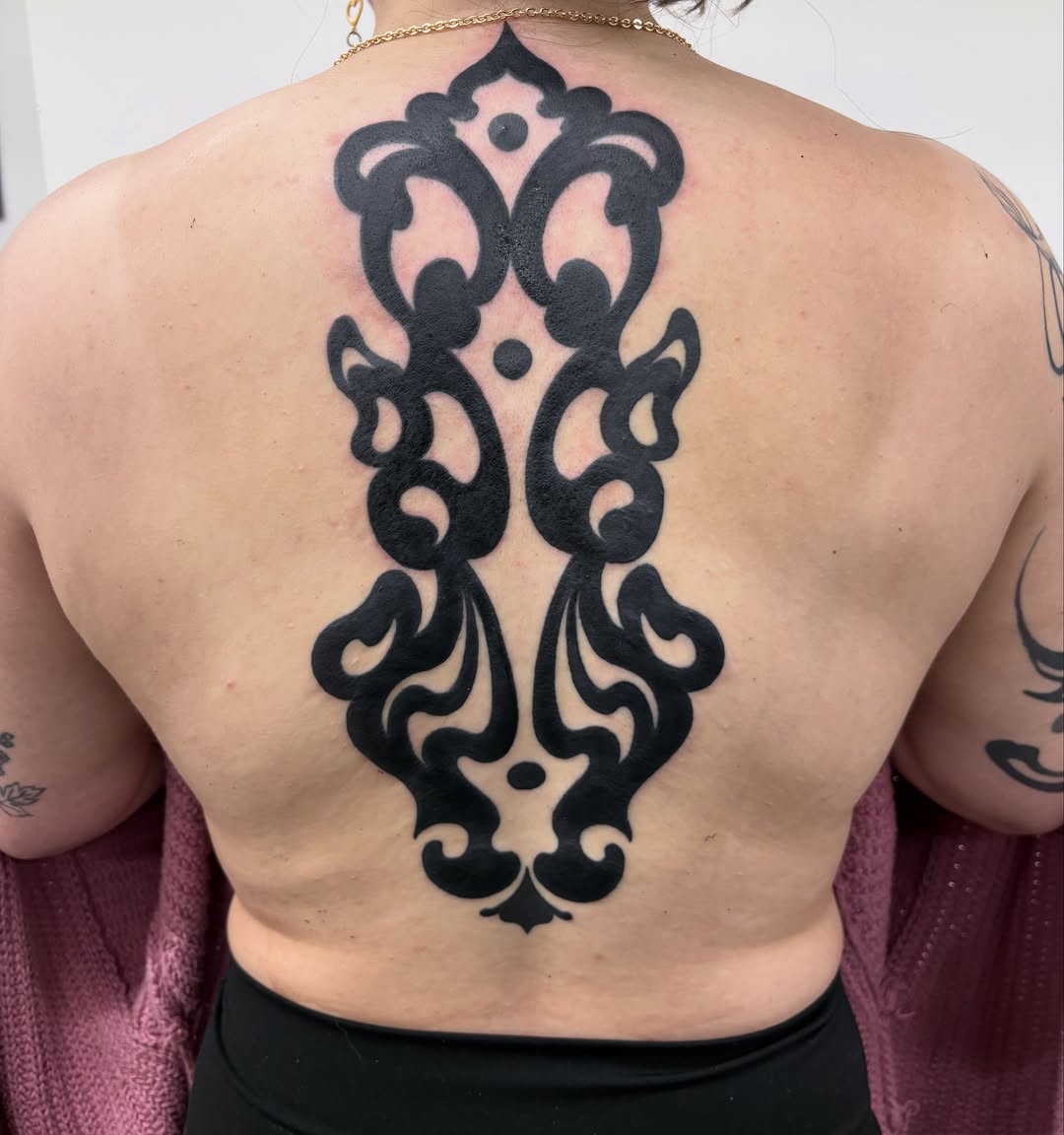 Tattoo by @slime.time.live — blackwork, ornamental