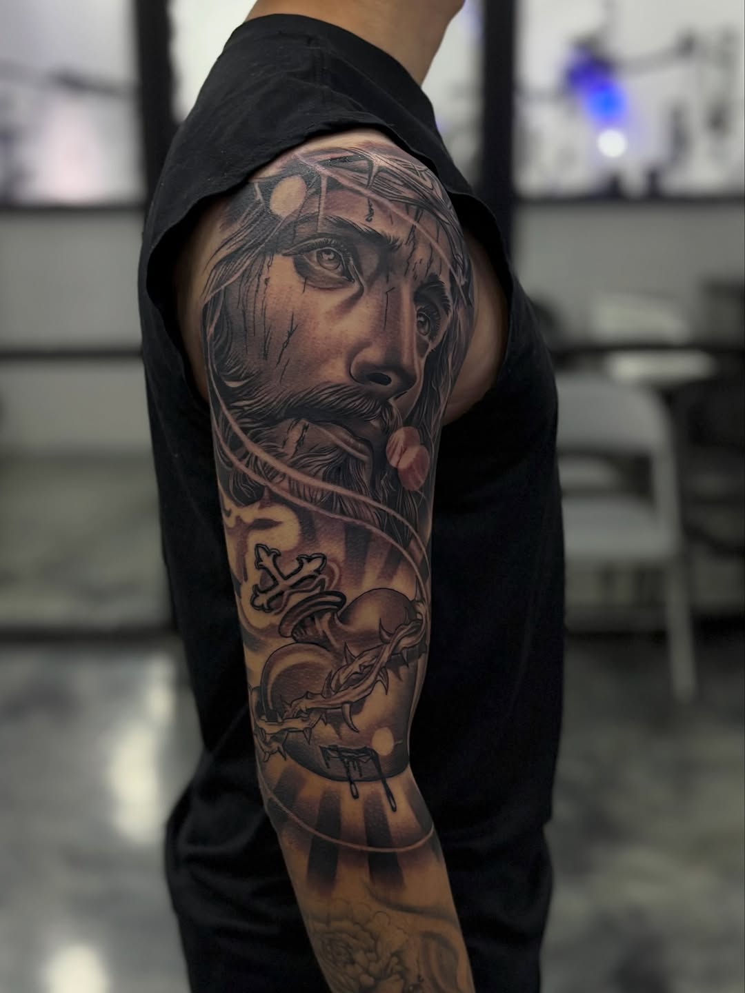 Tattoo by @tattedbydevin โ realism, black_and_grey