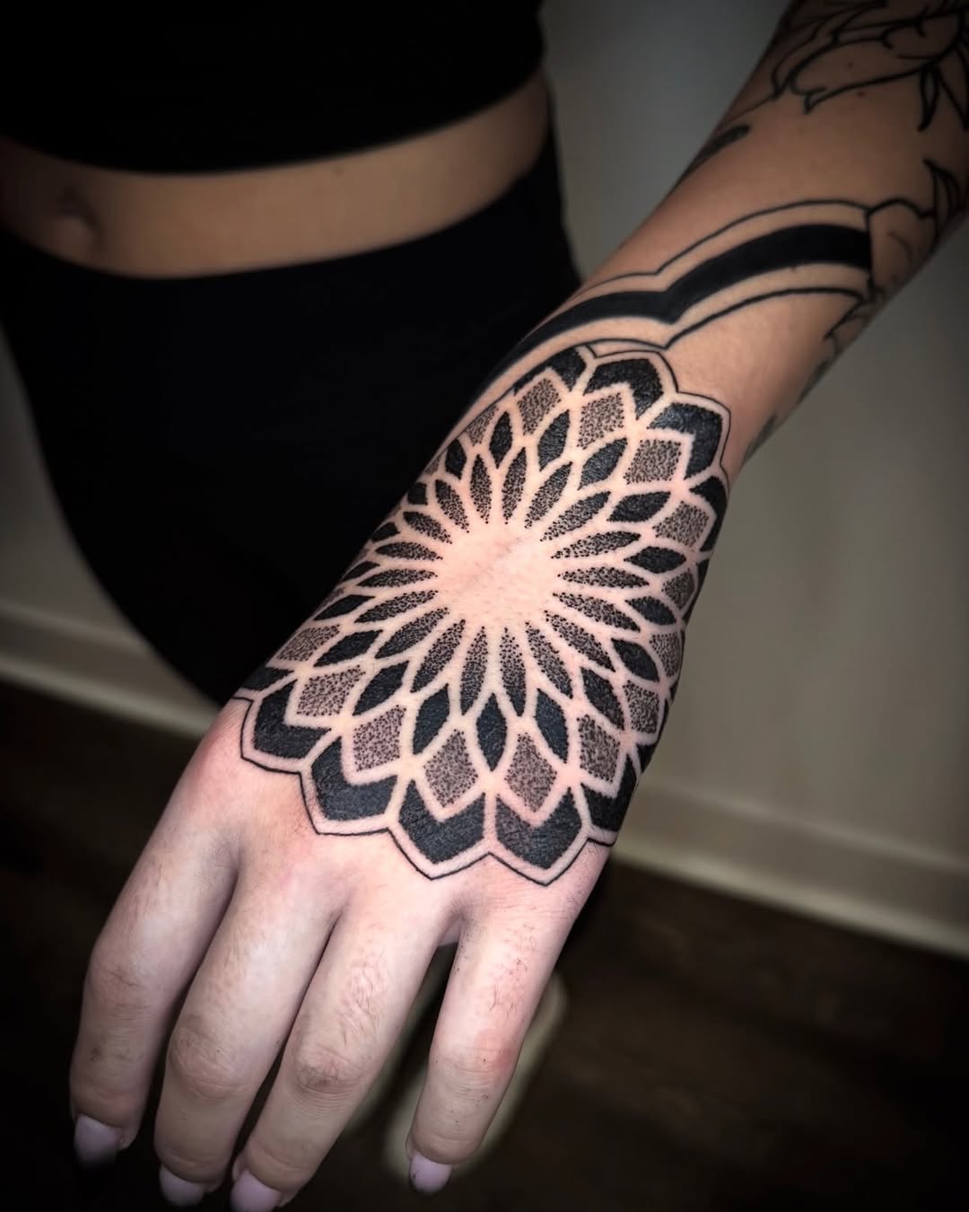 Tattoo by @symmetrychaos — geometric, dotwork