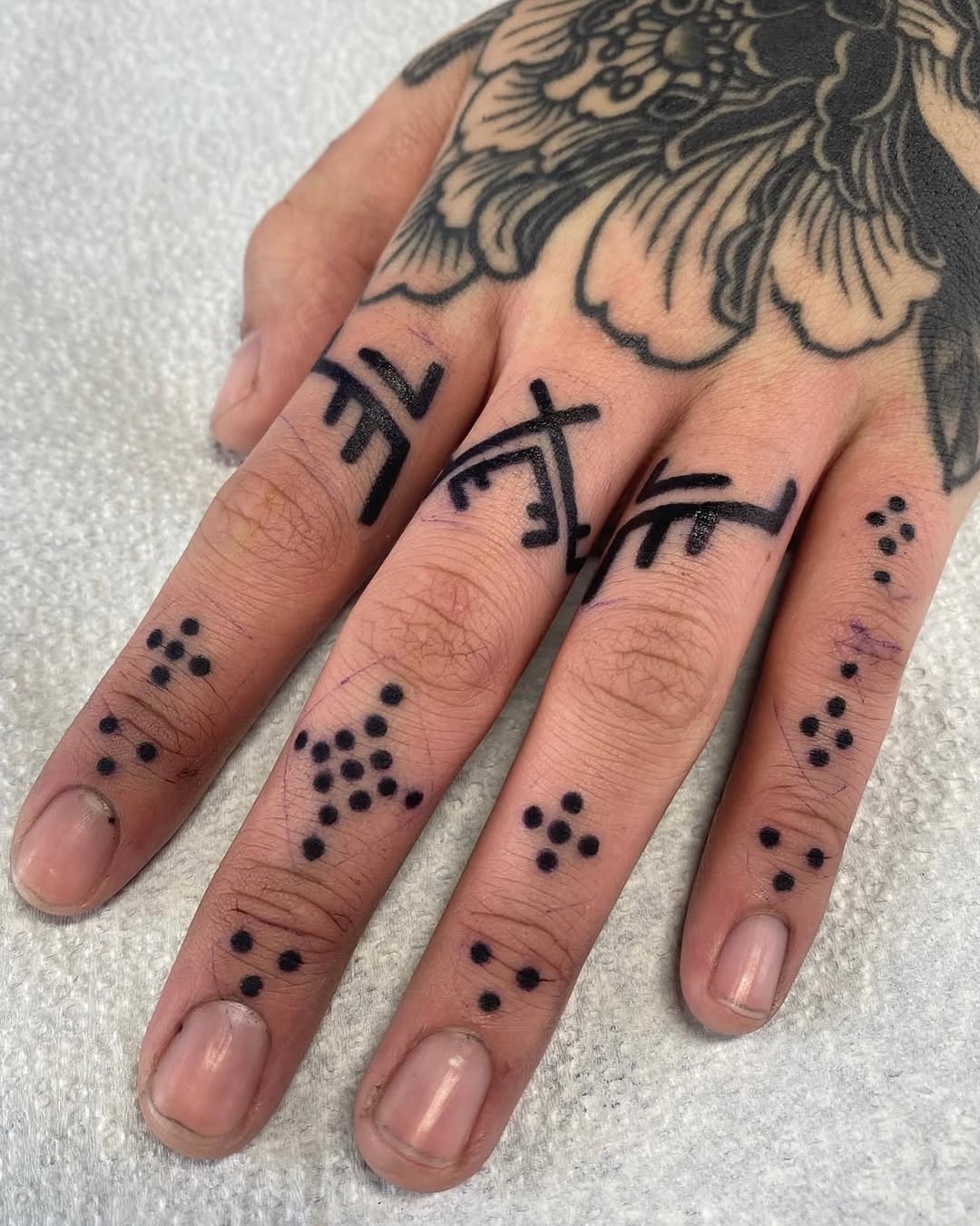 Tattoo by @symmetrychaos — geometric, dotwork