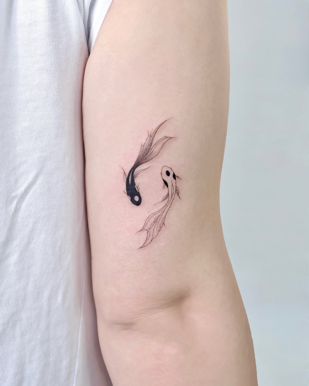 Tattoo by @tattooist_mora — fine_line, black_and_grey
