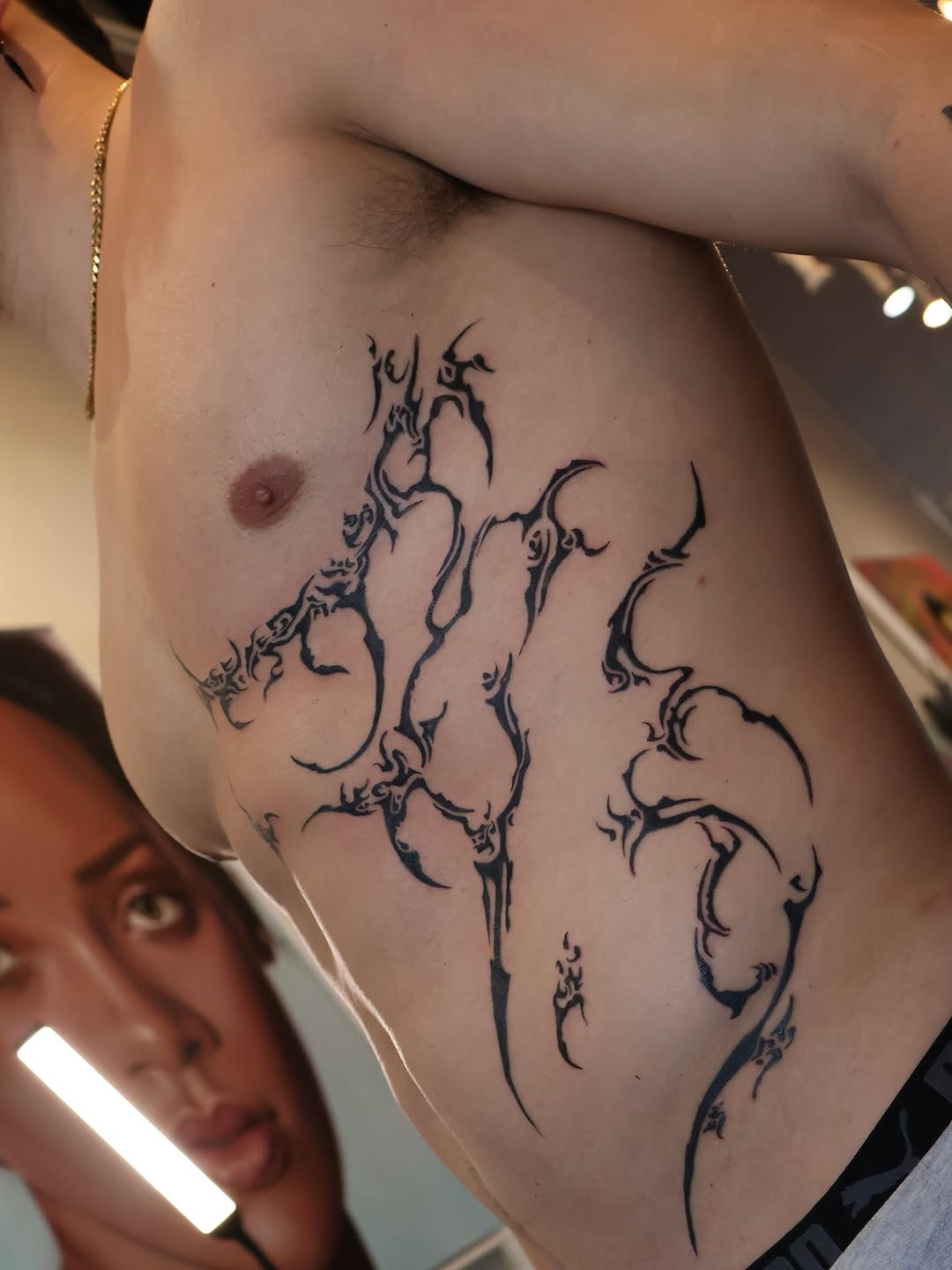 Tattoo by @zarmina_tattoo — blackwork