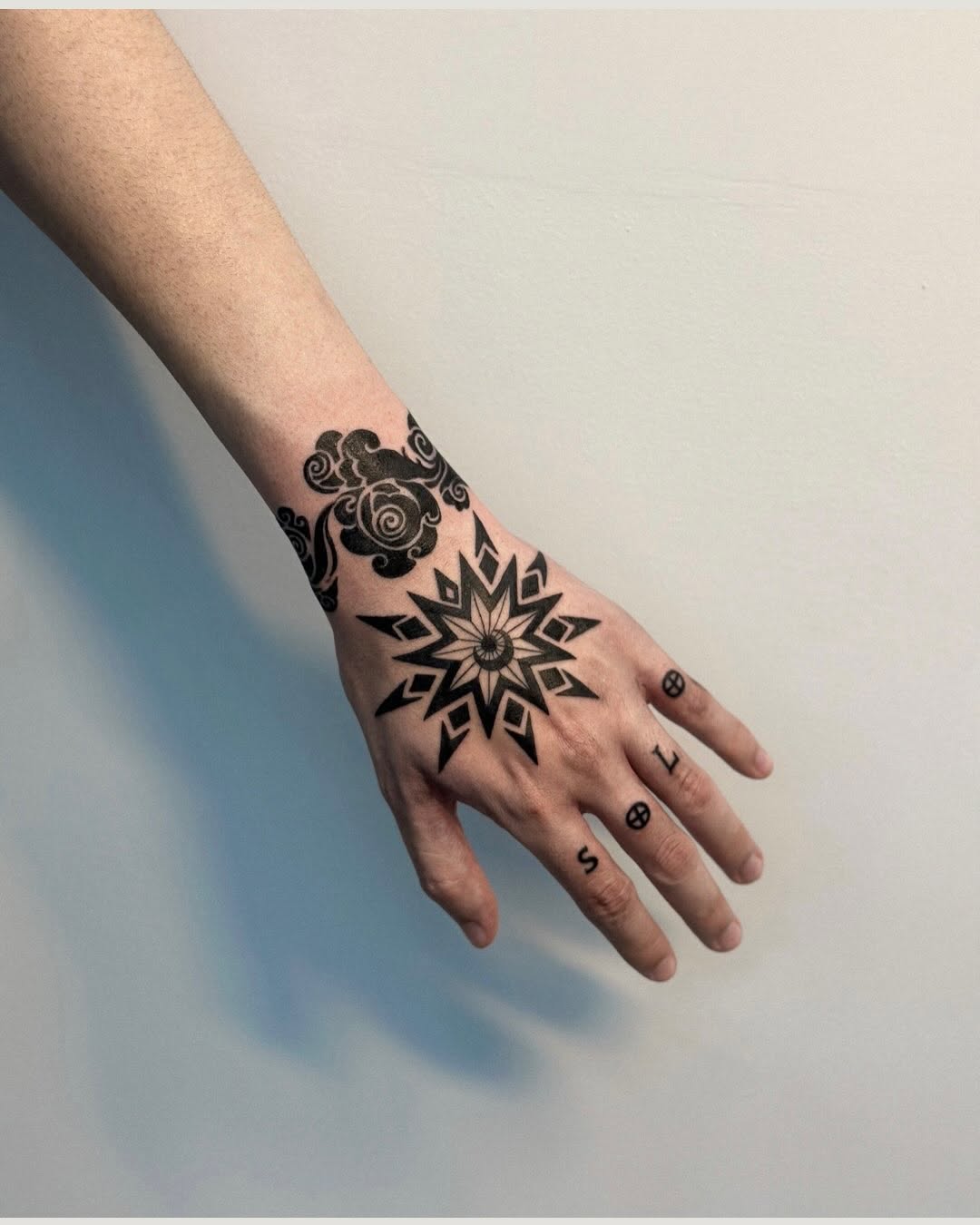 Tattoo by @elvira_savchuk — blackwork, geometric