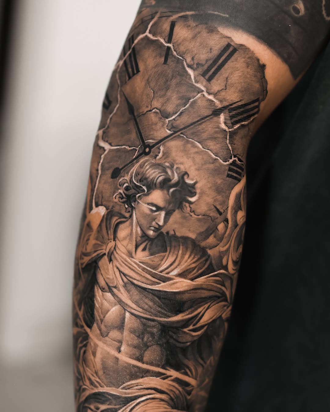 Tattoo by @tattooist_reset — realism, black_and_grey