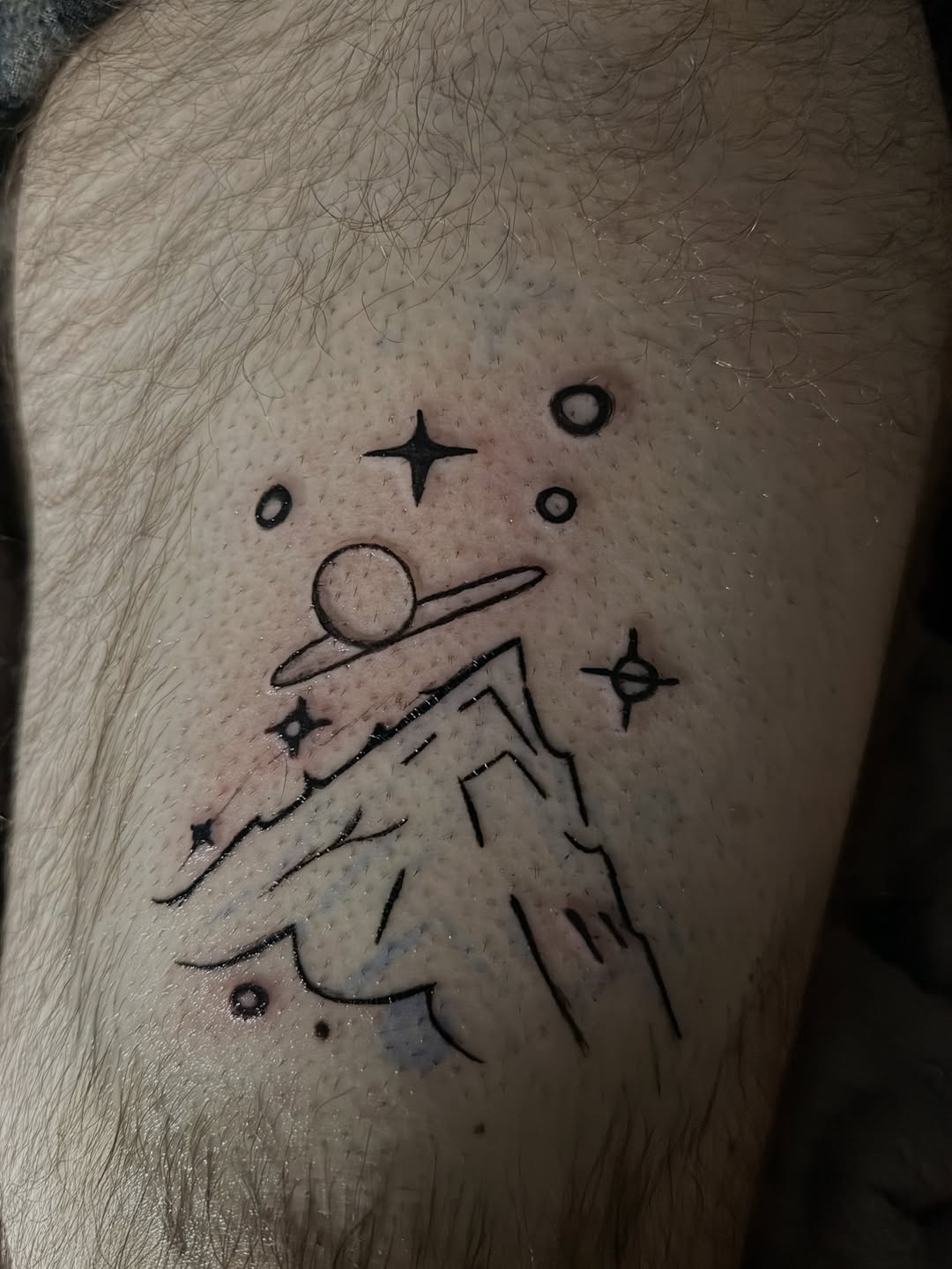 Tattoo by @inked.by.rayv — illustrative, minimalist