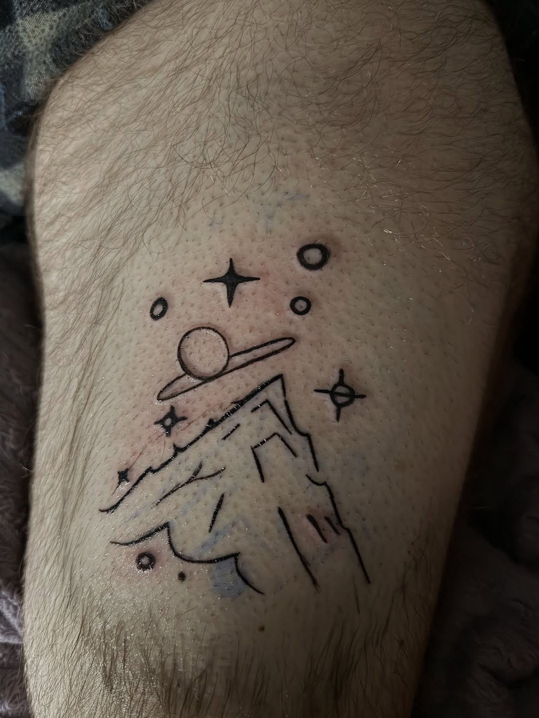 Tattoo by @inked.by.rayv — illustrative, minimalist