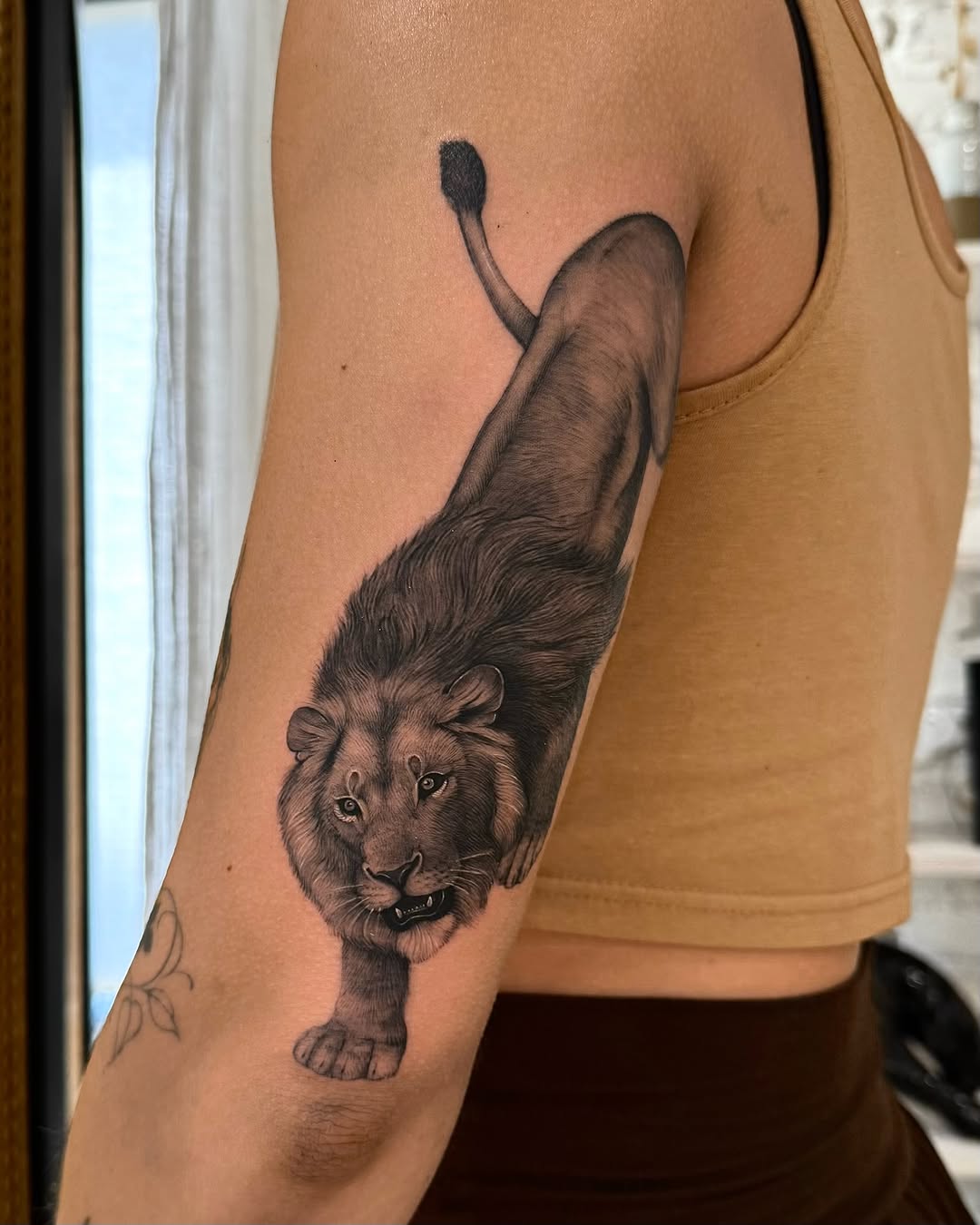 Tattoo by @tiny_tim.tatts โ realism, black_and_grey