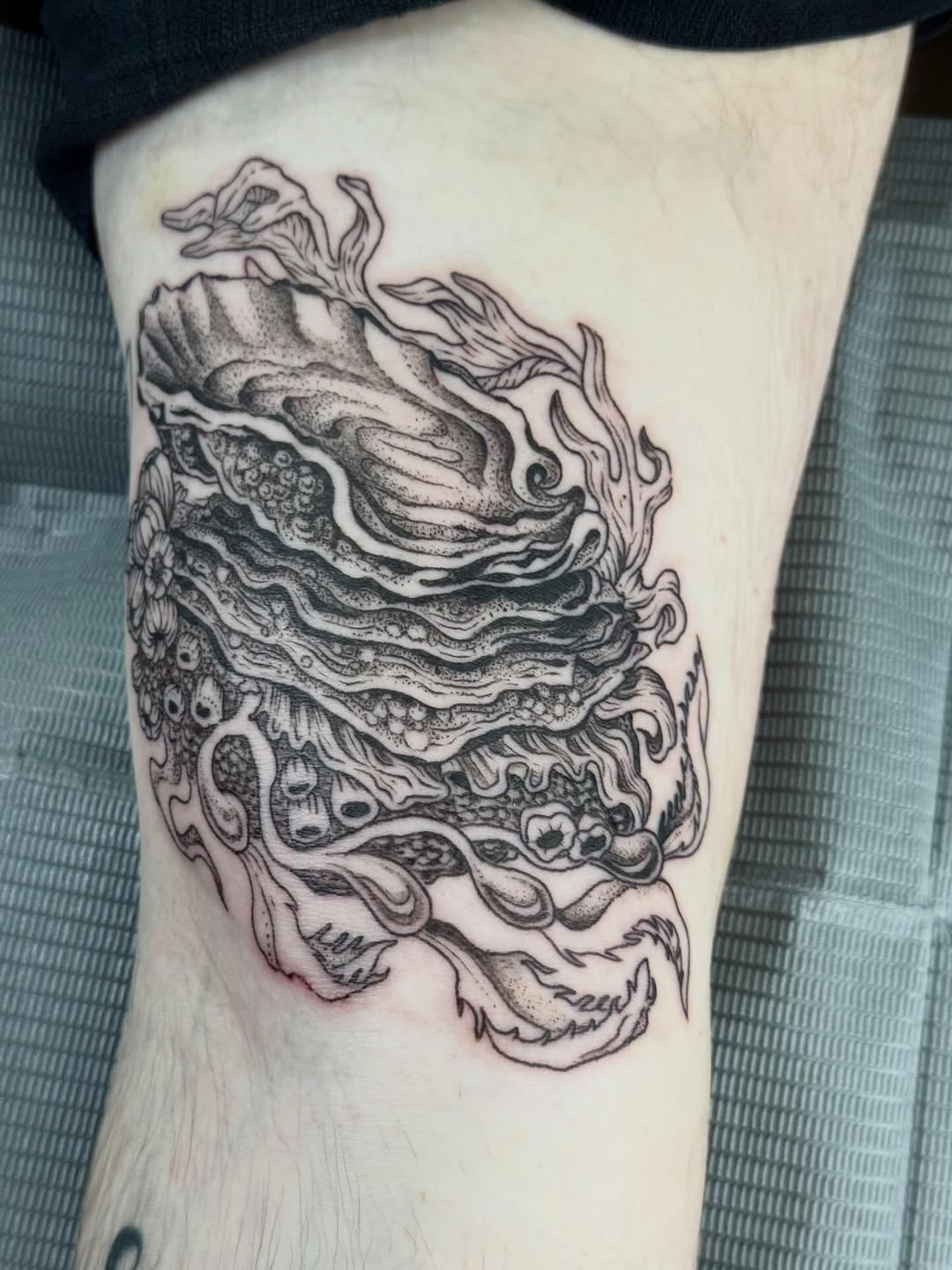 Tattoo by @writhingdirty — illustrative, dotwork