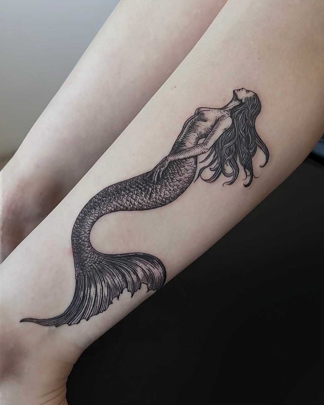Tattoo by @ruby.tats — black_and_grey, illustrative