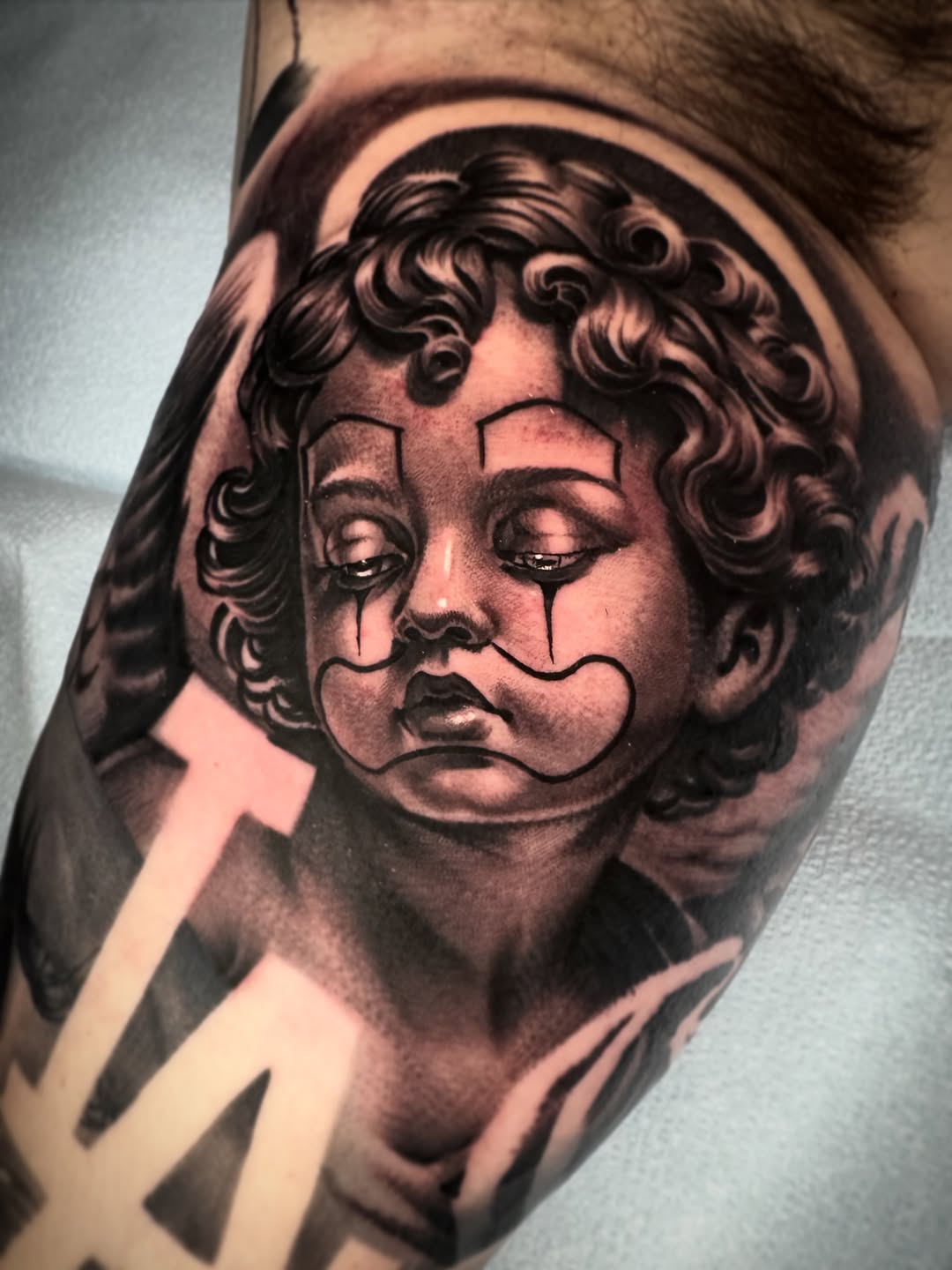 Tattoo by @tatts_by_t โ realism, black_and_grey