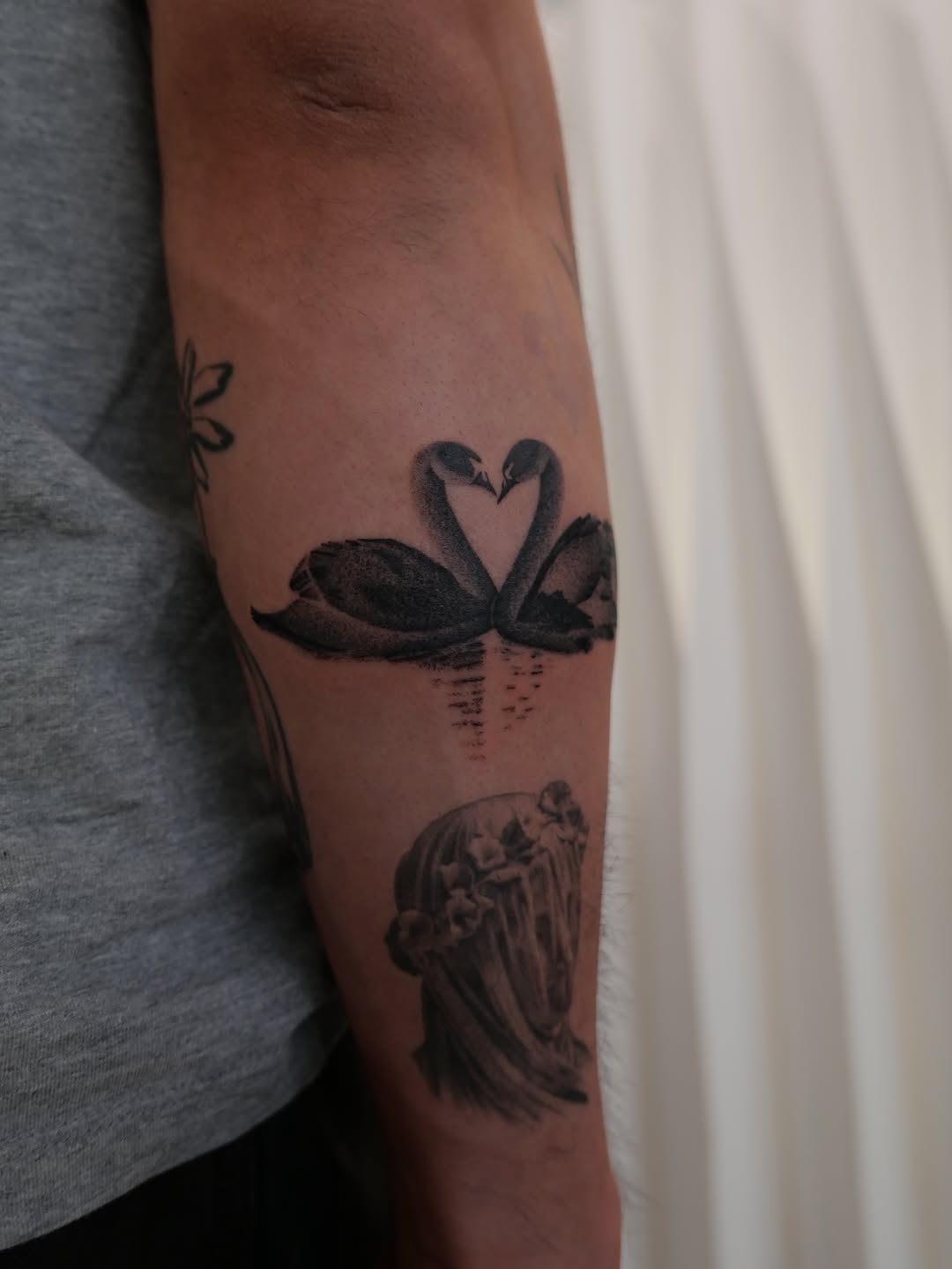 Tattoo by @skatarinski.tatts — realism, black_and_grey