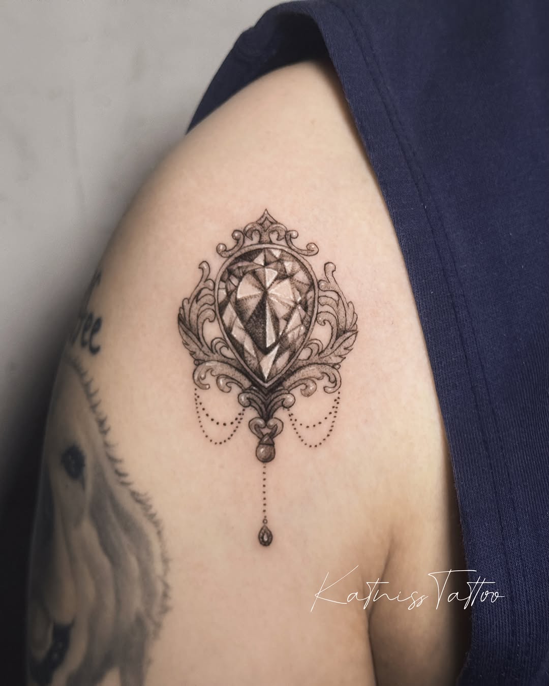 Tattoo by @circletattoo.katniss — illustrative, ornamental