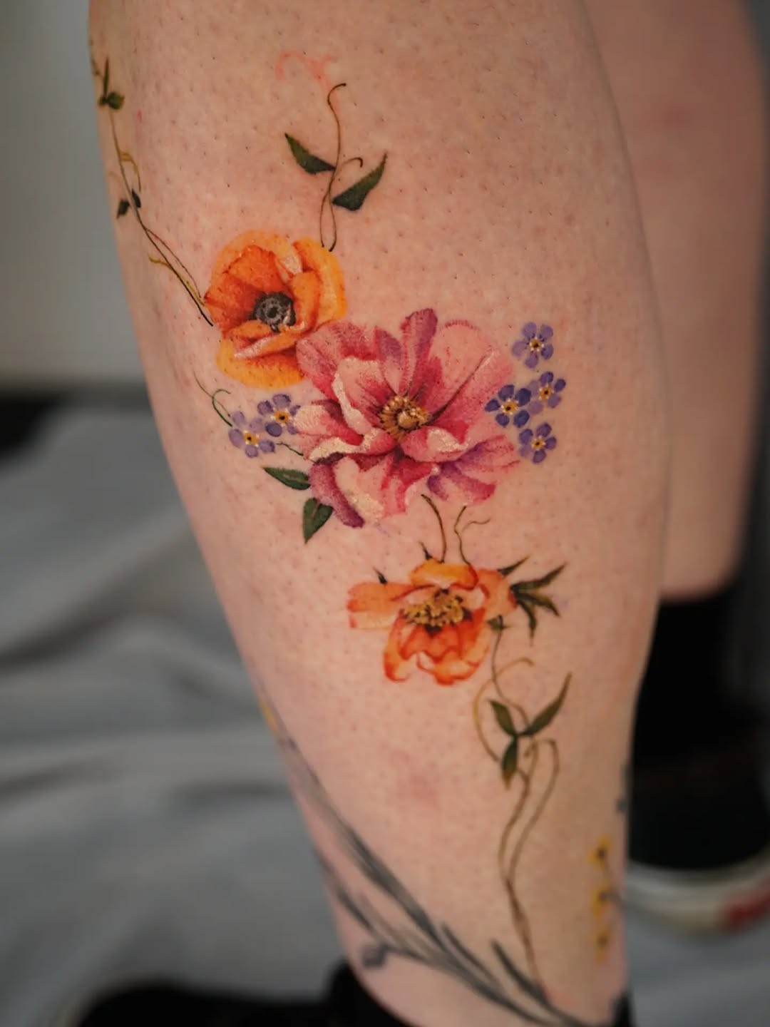 Tattoo by @vii_tattoo — watercolor, realism