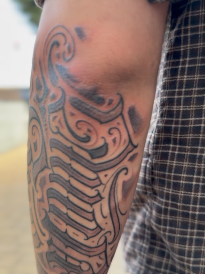Tattoo by @deft_ink — lettering_script, chicano