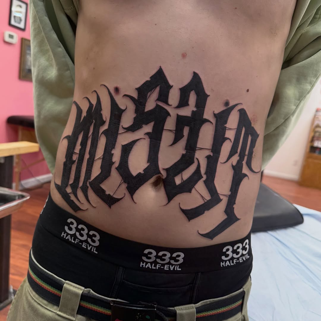 Tattoo by @theclovengnome โ lettering_script, blackwork