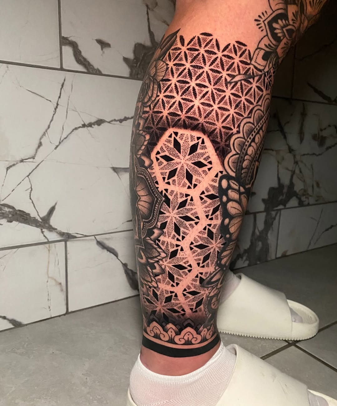 Tattoo by @nathena.ink — geometric, dotwork