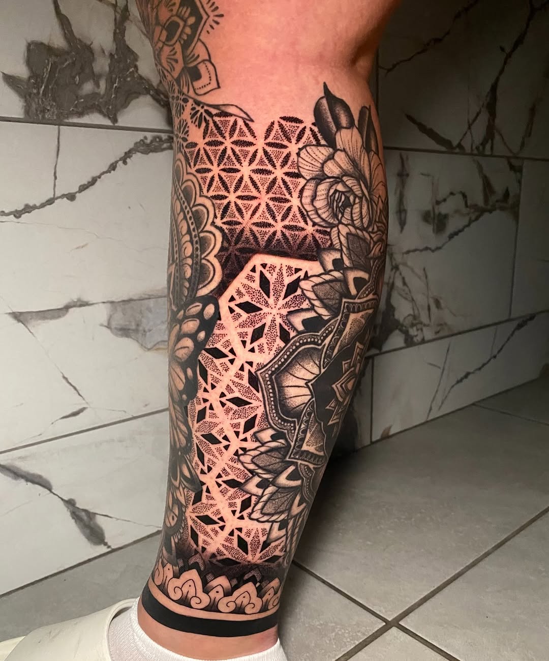 Tattoo by @nathena.ink — geometric, dotwork