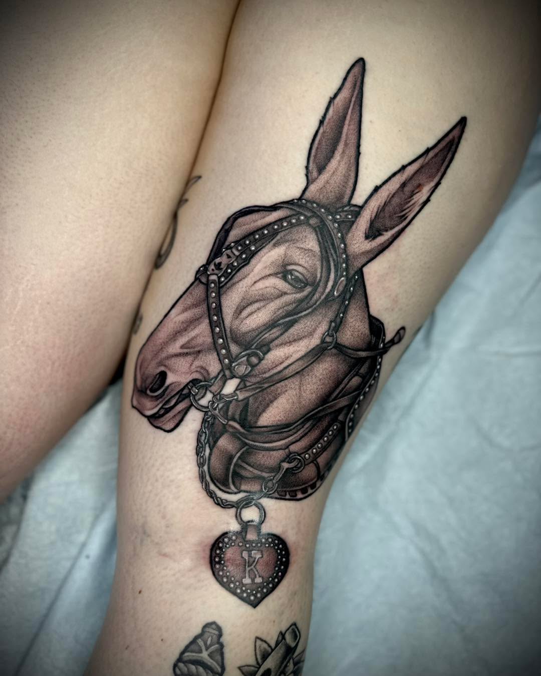 Tattoo by @madio_ink — realism, black_and_grey