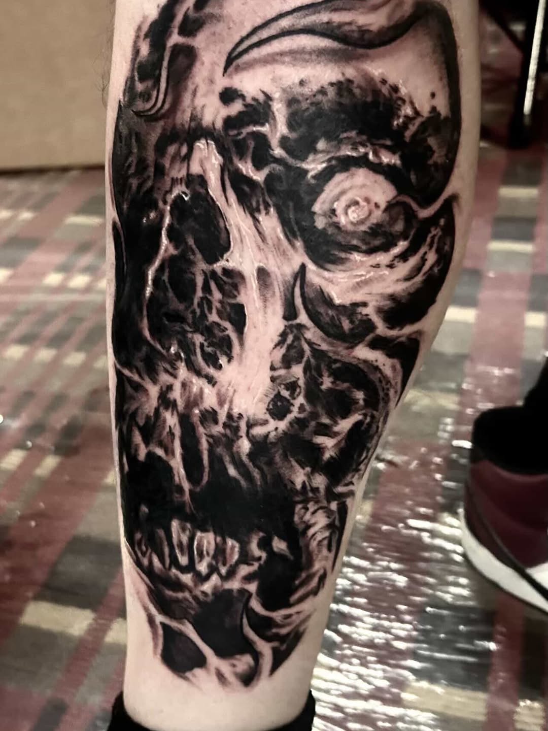 Tattoo by @austin_megallon — dark_realism, black_and_grey