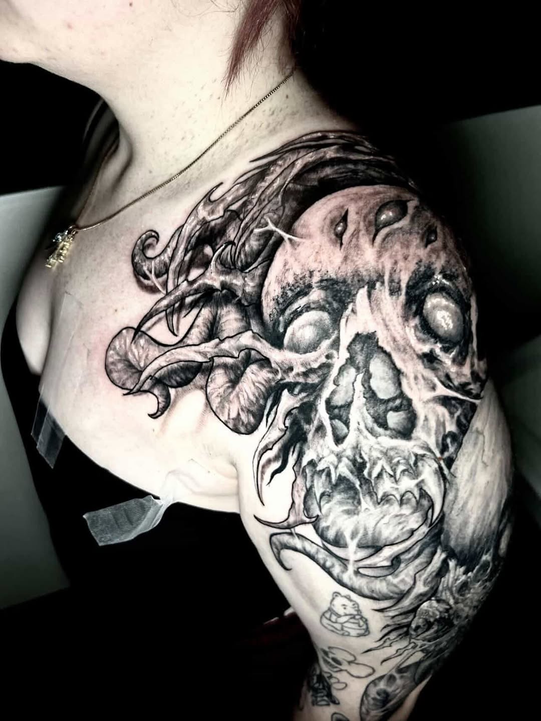 Tattoo by @austin_megallon — dark_realism, black_and_grey
