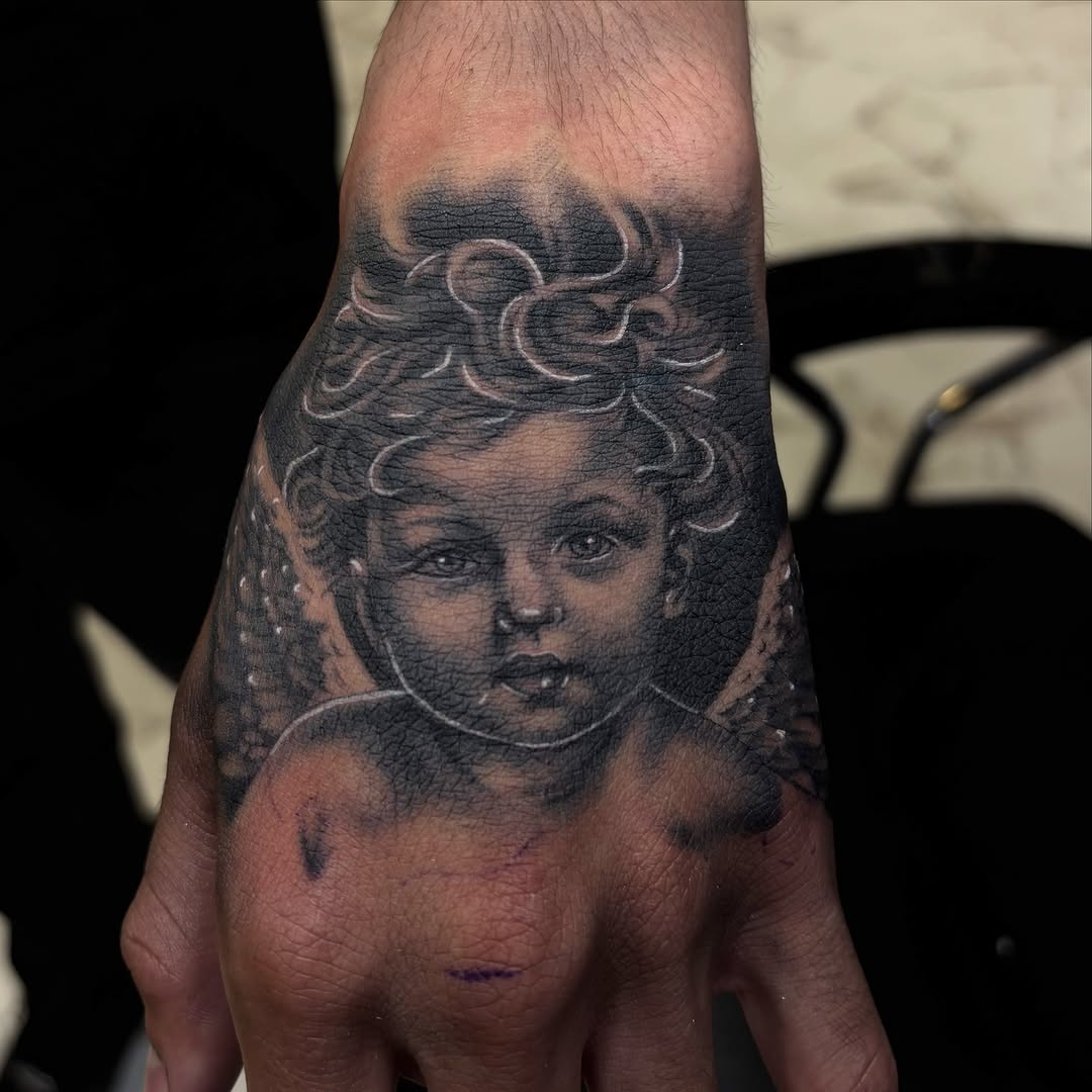 Tattoo by @venuss.inks — realism, black_and_grey