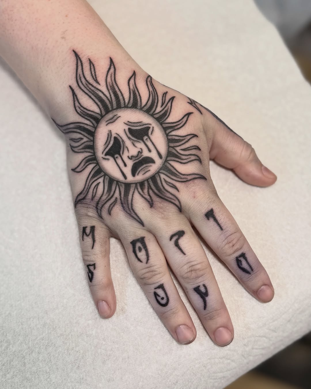 Tattoo by @niaink — illustrative, blackwork