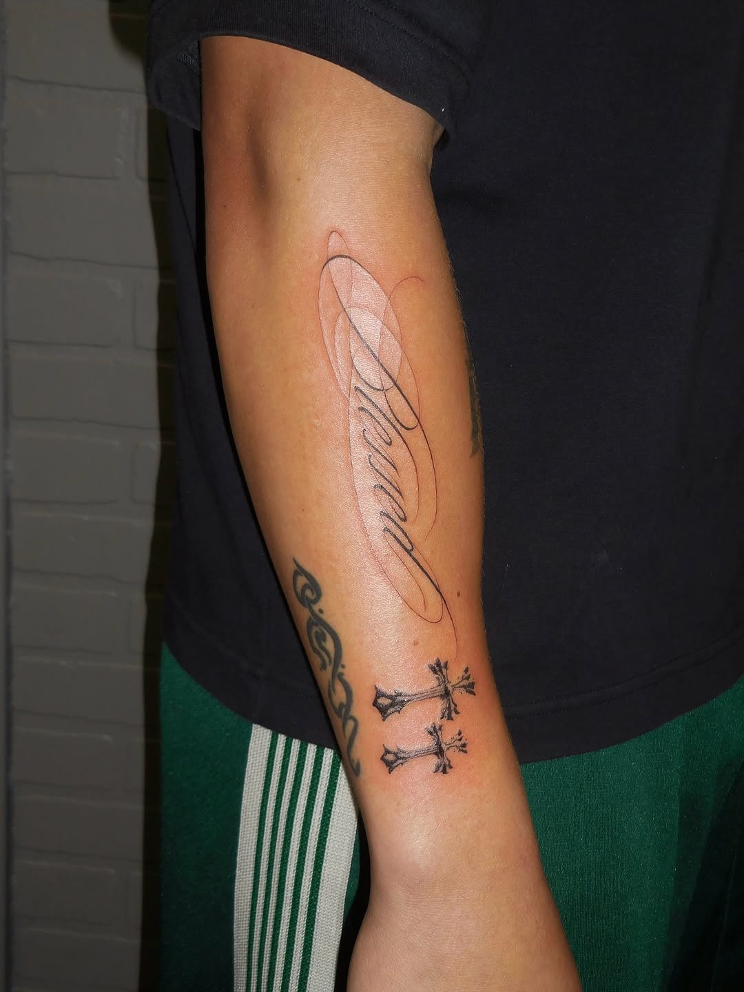 Tattoo by @vaehinked — lettering_script, black_and_grey