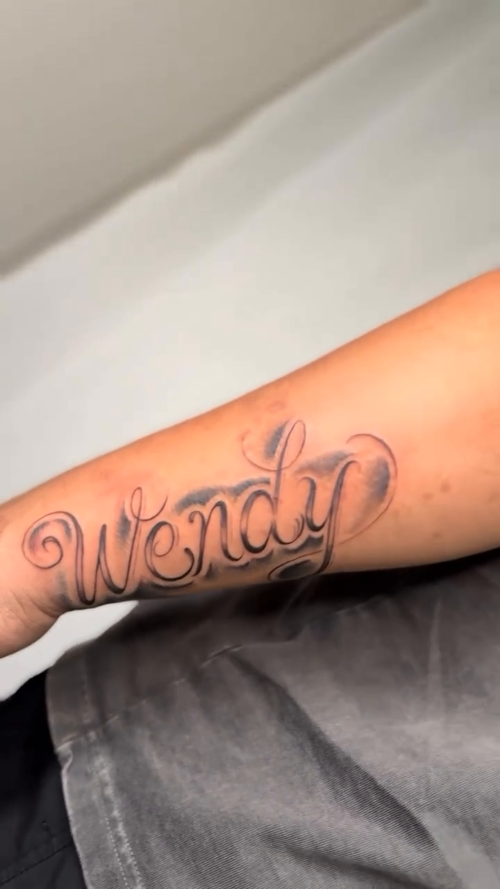 Tattoo by @papamule_ — lettering_script, black_and_grey
